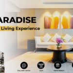 A luxurious living room with modern decor and amenities, representing the premier living experience at MGI Paradise. Your Premier Living Experience